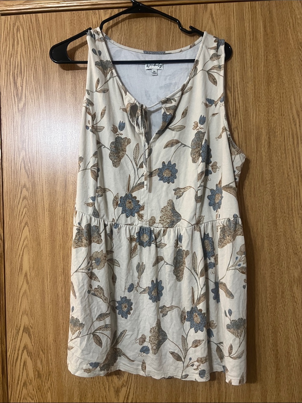 Wonderly Cream Sleeveless Top with Blue and Brown Floral Tie